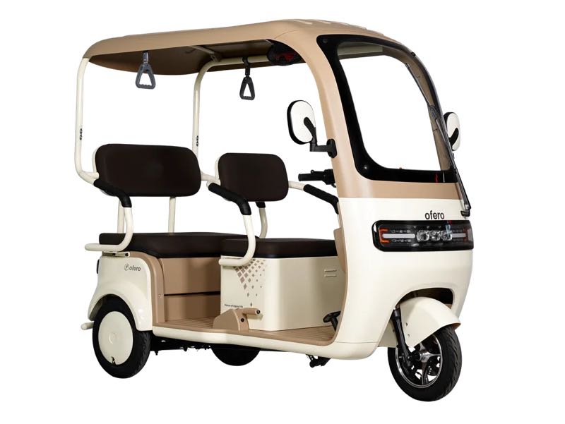 Ofero Agila, a beige 3-wheel ebike with a roof, a front windscreen and two passenger benches